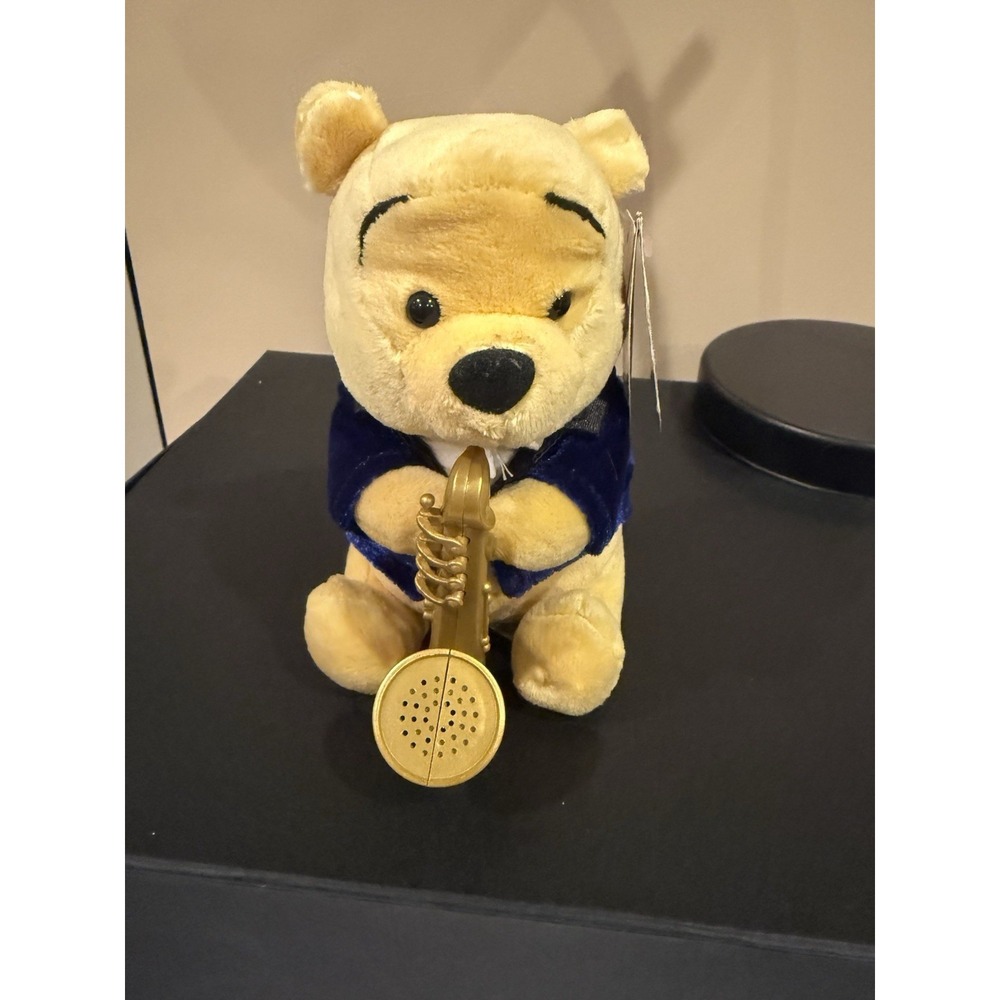 Vintage Disney Winnie the Pooh Plush Toy Playing Saxophone w slight damaged tag.